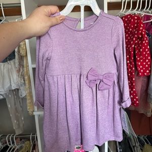 Two outfits both Carter’s. Brand new with tags size 12 months